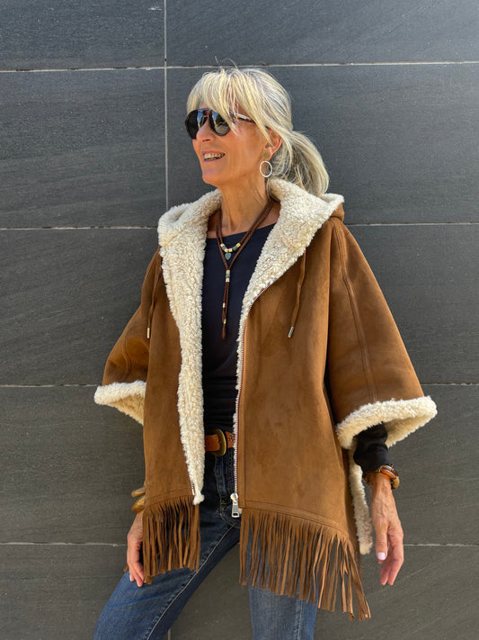 Poncho de flecos EVE
